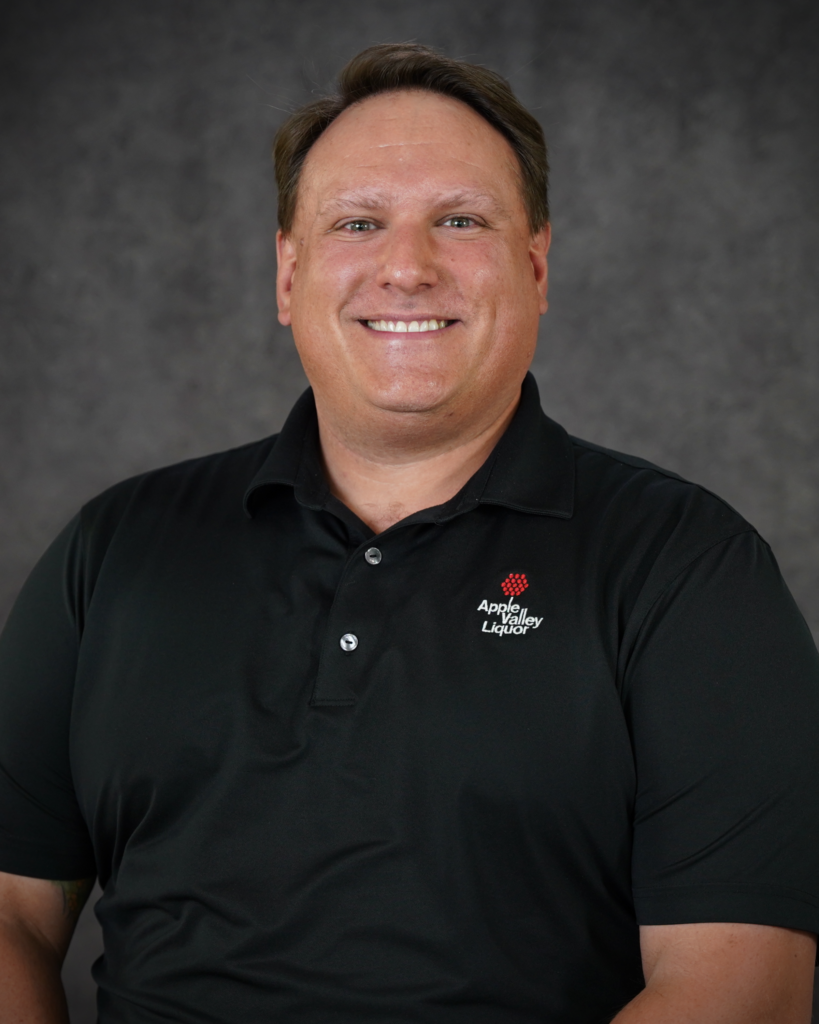 Bobby Bloch, Manager Store #2 headshot with Apple Valley Liquor polo